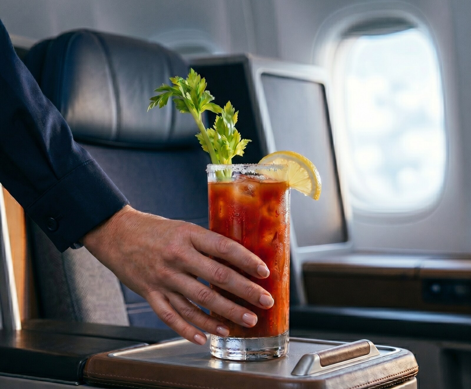 A bloody mary served in an aircraft business-class cabin.